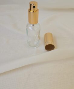 Glasflasche mit goldenem Sprühkopf 30 ml.